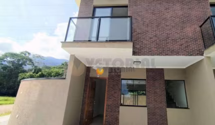 Sobrado com 2 dormitórios à venda, 83 m² por R$ 530.000,00 - Massaguaçu - Caraguatatuba/SP