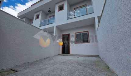 Sobrado com 2 dormitórios à venda, 73 m² por R$ 360.000 - Massaguaçu - Caraguatatuba/SP
