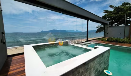 Casa  pé na areia com 3 suites  à venda, 236 m² por R$ 4.000.000 - Massaguaçu - Caraguatatuba/SP