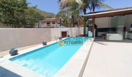 Casa com 5 dormitórios à venda, 165 m² por R$ 1.000.000 - Martim de Sá - Caraguatatuba/SP