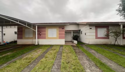 Casa em condomínio fechado com 3 quartos à venda na Avenida Paulo Roberto Vidal, 1, Bela Vista, Palhoça por R$ 340.000