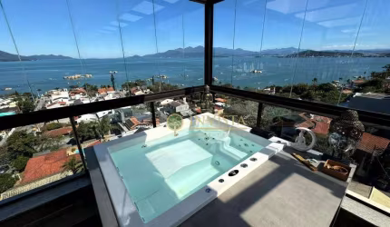 Vista mar, sacada com churrasqueira, terraço privativo com jacuzzi, 2 suítes e 2 vagas à venda em Coqueiros.