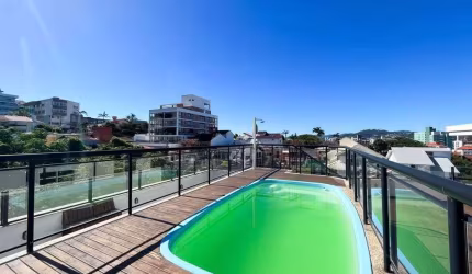 À venda em Coqueiros! Terraço privativo com piscina, vista Mar, 3 suítes e 3 vagas.
