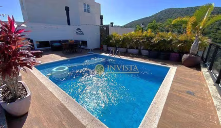 À venda | Terraço privativo com piscina, espaço gourmet, 3 quartos e 4 vagas de garagem - Itacorubi, em Florianópolis.