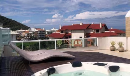 Duplex à venda na Praia dos Ingleses! Terraço privativo com hidromassagem, 4 quartos e 2 vagas de garagem.