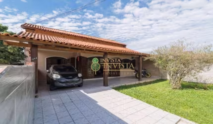 Espaço gourmet, 3 quartos e amplo terreno à venda no Carianos.