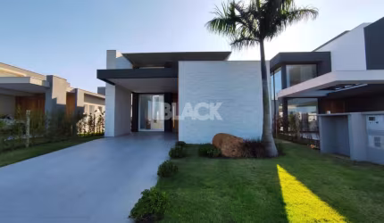 Casa fundos lago no Reserva das Águas em Torres RS