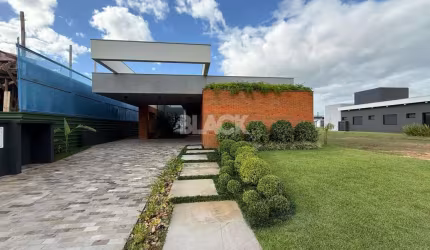 Casa fundos lago no Reserva das Águas em Torres RS