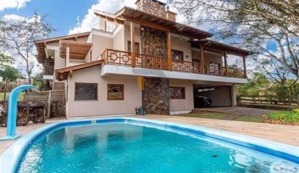 Casa com 5 dormitórios à venda, 460 m² por R$ 2.700.000,00 - Paragem dos Verdes Campos - Gra