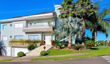 Casa com 5 dormitórios à venda, 747,51 m² - Alphaville/Gravataí