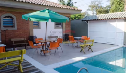 CASA TERREA NO TREMEMBÉ - 3 SUÍTES E 6  VAGAS- PISCINA E LAREIRA