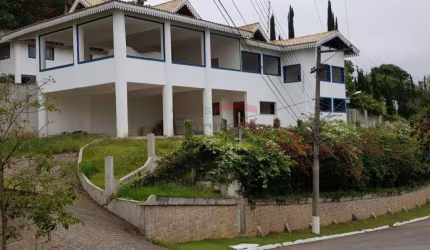 Sobrado alto padrão á venda no condomínio Suíça Cantareira - 4 dormitórios e 5 vagas.