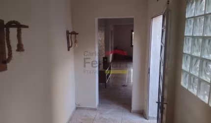 SOBRADO COM 3 DORMITÓRIOS,  COM 2 VAGAS DE GARAGEM, QUINTAL COM CHURRASQUEIRA
