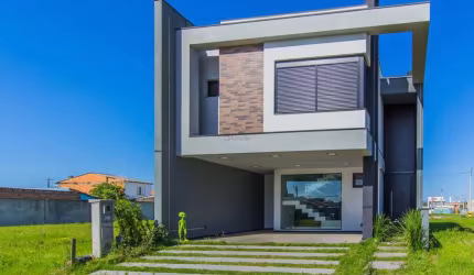 vende sobrado novo em condomínio com 3 suítes em Canoas.