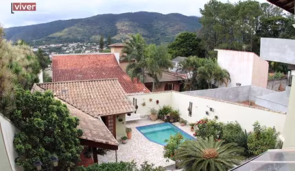 Casa com 3 dormitórios, 401 m² - venda por R$ 2.250.000,00 ou aluguel por R$ 15.628,21/mês - Vila Petrópolis - Atibaia/SP
