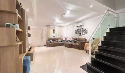 Sobrado à venda, 121 m² por R$ 630.000,00 - Maracanã - Praia Grande/SP
