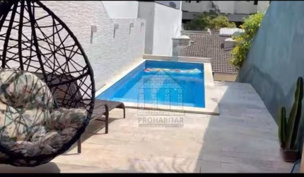 Sobrado com Piscina e 03 dormitórios.