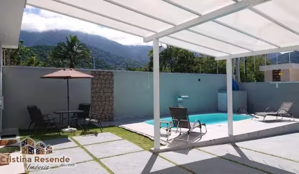 Casa com 3 quartos à venda no Massaguaçu, Caraguatatuba  por R$ 960.000