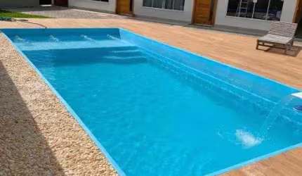 Casa em condomínio fechado com 2 quartos à venda no Massaguaçu, Caraguatatuba  por R$ 450.000