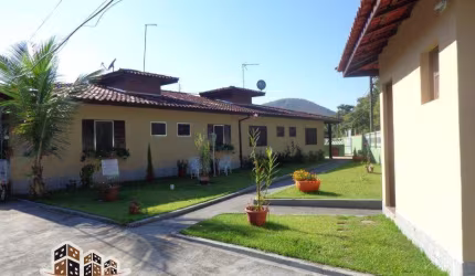 Casa em condomínio fechado com 2 quartos à venda no Martim de Sá, Caraguatatuba  por R$ 320.000
