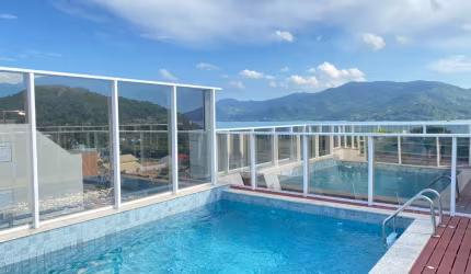 APARTAMENTO COM TRÊS QUARTOS NA PRAIA GRANDE