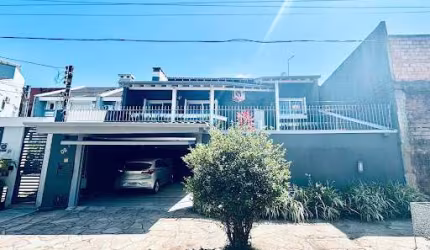 Casa com 3 dormitórios, 220 m² - venda por R$ 1.285.000,00 ou aluguel por R$ 8.700,00 - Santo André - São Leopoldo/RS
