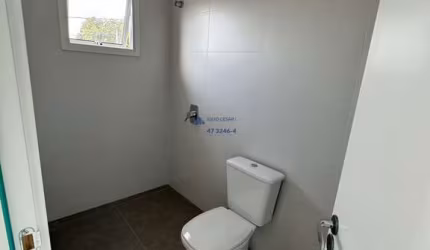 Geminado com 3 dormitorios sendo 1 suite e 2 vagas no Bairro Espinheiros em Itajai