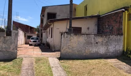 Terreno com casa bairro camboim