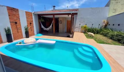 casa com piscina quiosque e churrasqueira