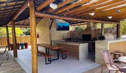 Village com 4 dormitórios à venda, 165 m² por R$ 990.000,00 - Itacimirim (monte Gordo) - Camaçari/BA