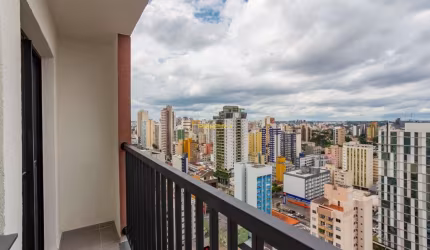 Studio 23m² ANDAR ALTO com Sacada em Condomínio Clube no Centro