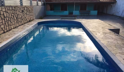 Casa com 3 dormitórios à venda por R$ 850.000,00 - Praia das Palmeiras - Caraguatatuba/SP