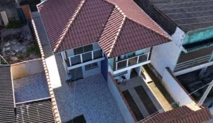 Sobrado com 3 dormitórios à venda, 87 m² por R$ 400.000,00 - Balneário Califórnia - Caraguatatuba/SP