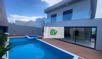 MARAVILHOSA CASA ALTO PADRÃO EM CONDOMÍNIO FECHADO com 4 dormitórios à venda, 304 m² por R$ 2.700.000,00 - Massaguaçu - Caraguatatuba/SP