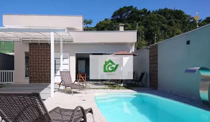 Casa com 3 dormitórios à venda, 150 m² por R$ 890.000,00 - Massaguaçu - Caraguatatuba/SP
