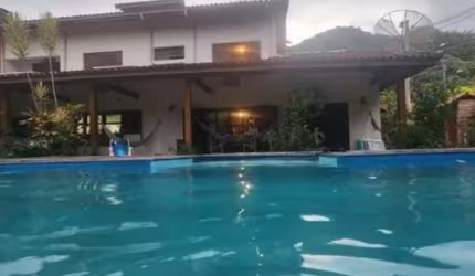 Casa com 6 dormitórios à venda, 480 m² por R$ 3.600.000,00 - Santiago - São Sebastião/SP
