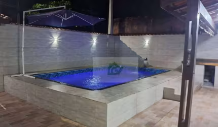 Casa com 3 dormitórios, piscina a 350m da praia à venda, 150 m² por R$ 530.000 - Porto Novo - Caraguatatuba/SP