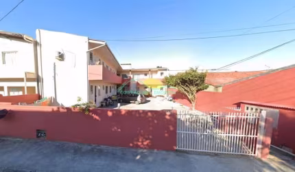 Edificação de alvenaria de dois pavimentos com 8 apartamentos de 1 quarto, 4 por pavimento, no Camp