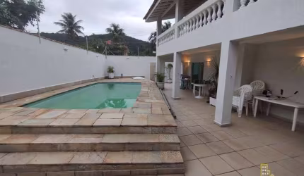 Sobrado com 4 dormitórios à venda, 273 m² por R$ 1.400.000,00 - Guaiuba - Guarujá/SP