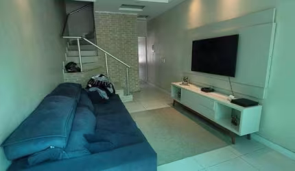 Sobrado com 3 dormitórios à venda, 79 m² por R$ 590.000,00 - Jardim Las Palmas - Guarujá/SP