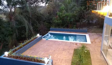 Casa com 3 dormitórios à venda, 354 m² por R$ 2.297.000,00 - Condomínio Chácara Flora - Valinhos/SP