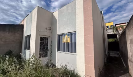 Casa Geminada à Venda Nova Esmeraldas: 2 Quartos, Quintal, 2 Vagas e Habite-se!