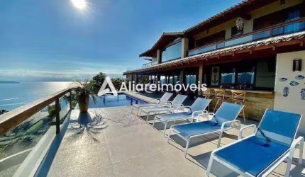 Casa c/ 9 quartos, 9 suítes e 6 vagas, 910m², à venda no bairro Ponta das Canas, por 13.000.000,00
