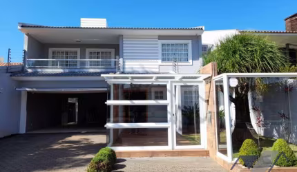 Casa com 5 dormitórios para alugar, 348 m² por R$ 7.500,00/mês - Neva - Cascavel/PR
