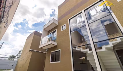 Sobrado com 3 dormitórios à venda, 104 m² por R$ 759.000 - Uberaba - Curitiba/PR