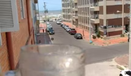 APARTAMENTO DOIS DORMITÓRIOS COM VISTA PARA O MAR E SACADA