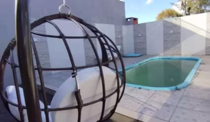 CASA ACONCHEGANTE COM PISCINA EM NOVA TRAMANDAÍ