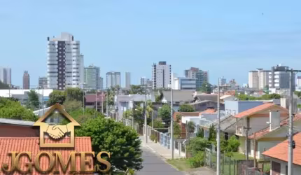 lindo duplex semi mobiliado no centro de Tramandaí próximo a mercado, padaria, farmácia e todo comercio local