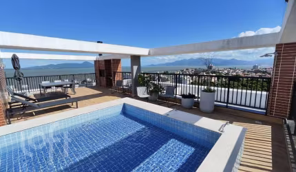 Apartamento à venda em Coqueiros com 83 m², 2 quar