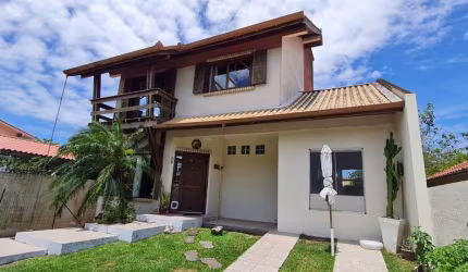 Casa de 5 dormitórios na praia da Armação